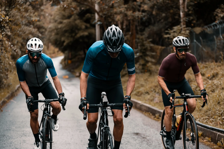 three cyclists outdoors
